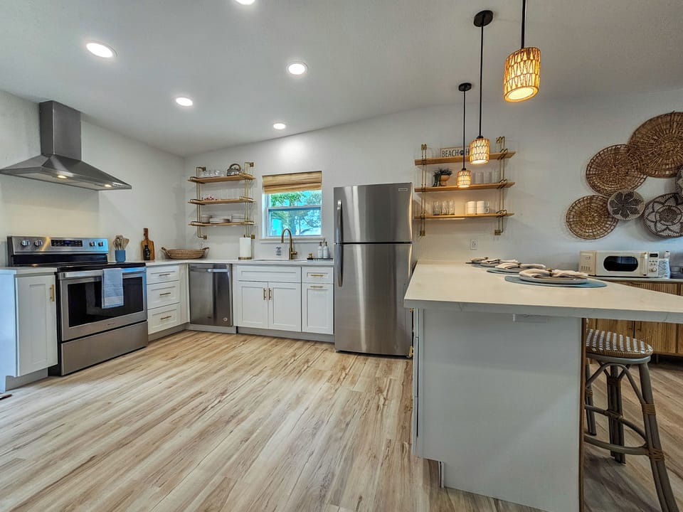 Beautifully stocked kitchen with everything you need to cook.