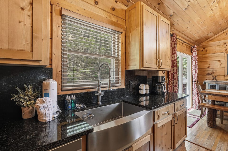 Step into your inviting kitchen, where natural light pours through the window as you prepare meals on gleaming countertops. Warm wood tones and modern amenities blend seamlessly for your comfort.