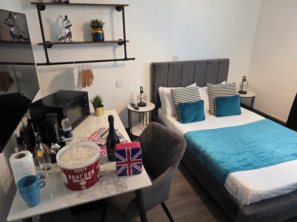 Standard Double Room | Desk, laptop workspace, blackout drapes, iron/ironing board