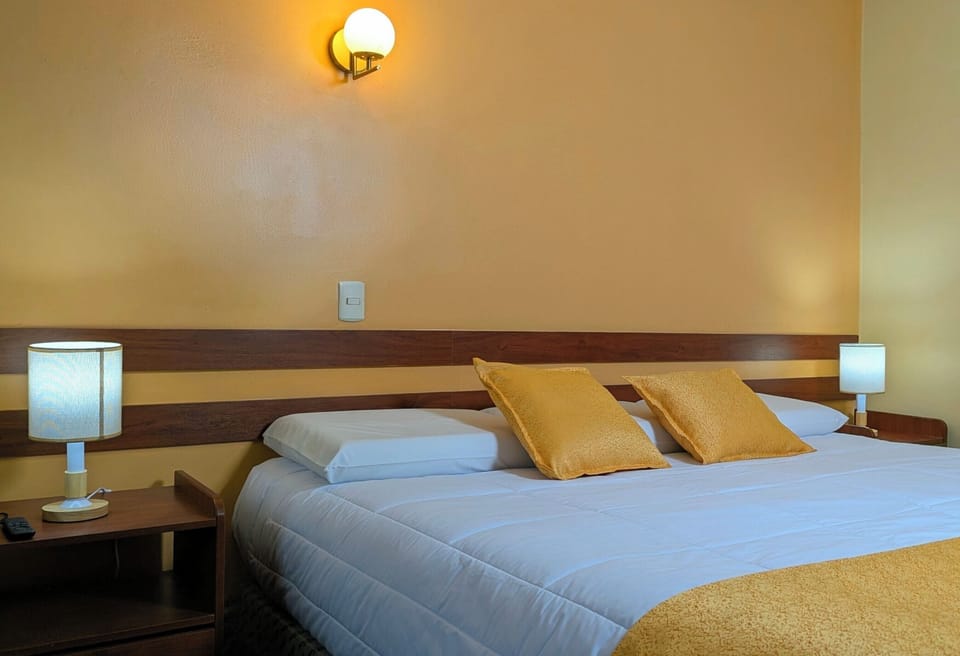 Desk, laptop workspace, free WiFi, bed sheets