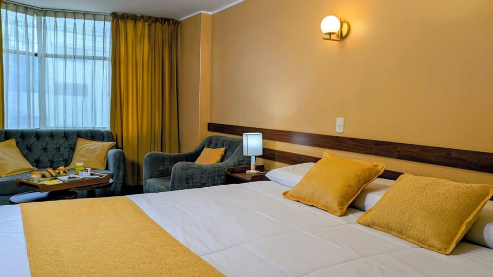 Desk, laptop workspace, free WiFi, bed sheets