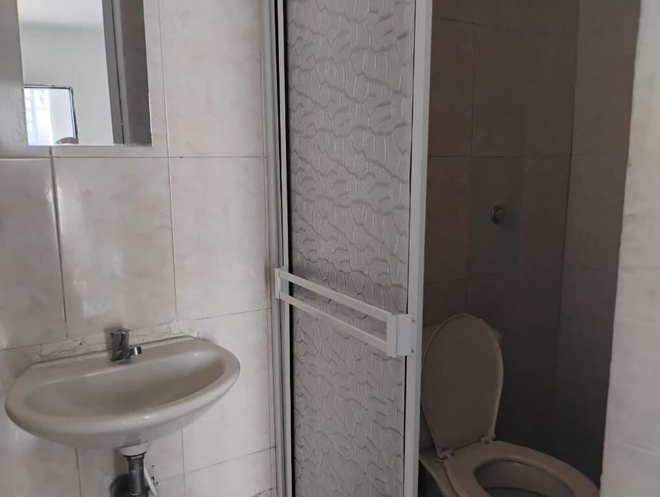 Shower, towels, soap, toilet paper