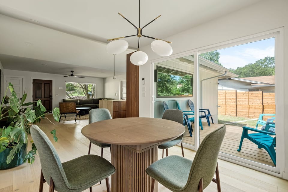 Bright dining area with deck access and seamless indoor-outdoor living