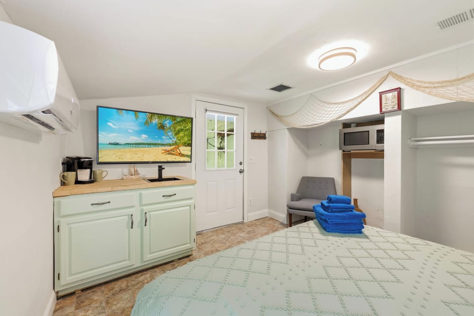 Includes small kitchenette with microwave and coffee station