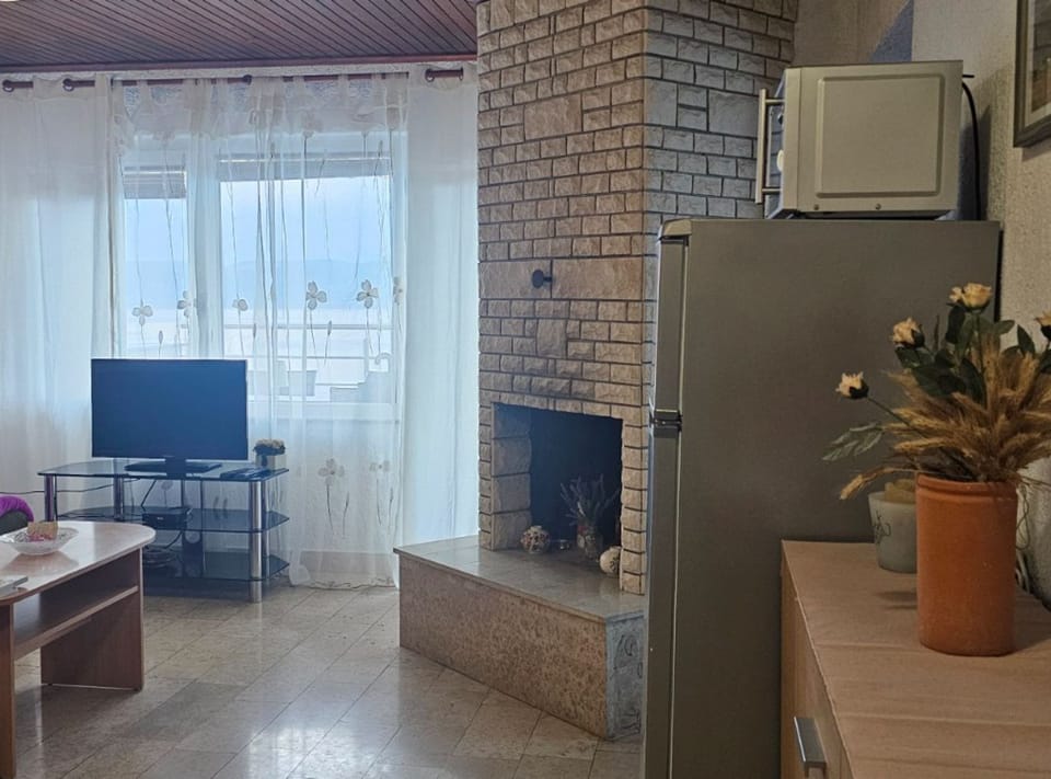 Apartment (Classic Two Bedroom Apartment with Te) | Living room | 32-inch flat-screen TV with satellite channels