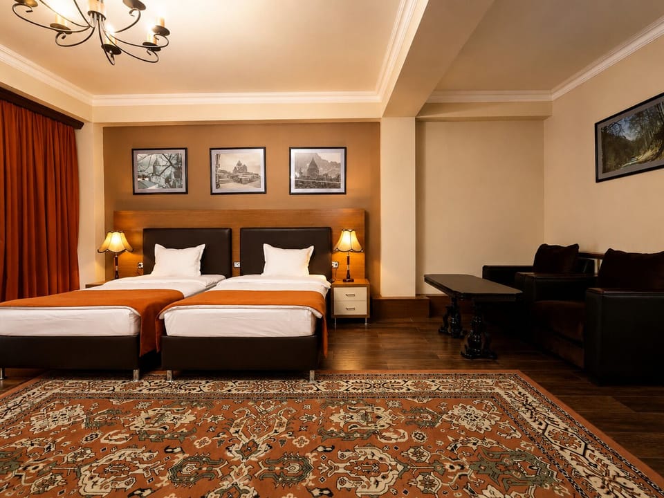 Deluxe Double or Twin Room | In-room safe, desk, laptop workspace, iron/ironing board