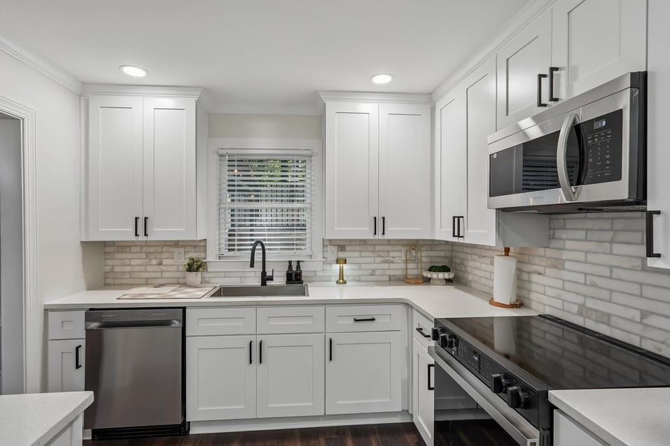 Kitchen - Fully equipped +stainless steel cookware +Dinnerware and Glassware for 8 +Air Fryer +Blender +Mixing bowls +Mixer +Toaster +Rice Maker +Coffee & Tea Bar +Baking Pans +Kitchen Utility & Measurement Tools +Storage bowls