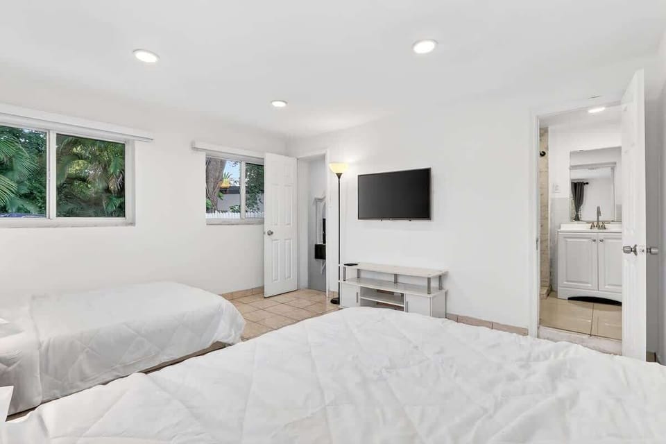 Two comfortable beds with hotel-quality linens