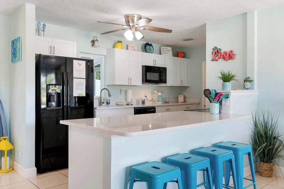 Fully equipped kitchen with essential appliances and cookware