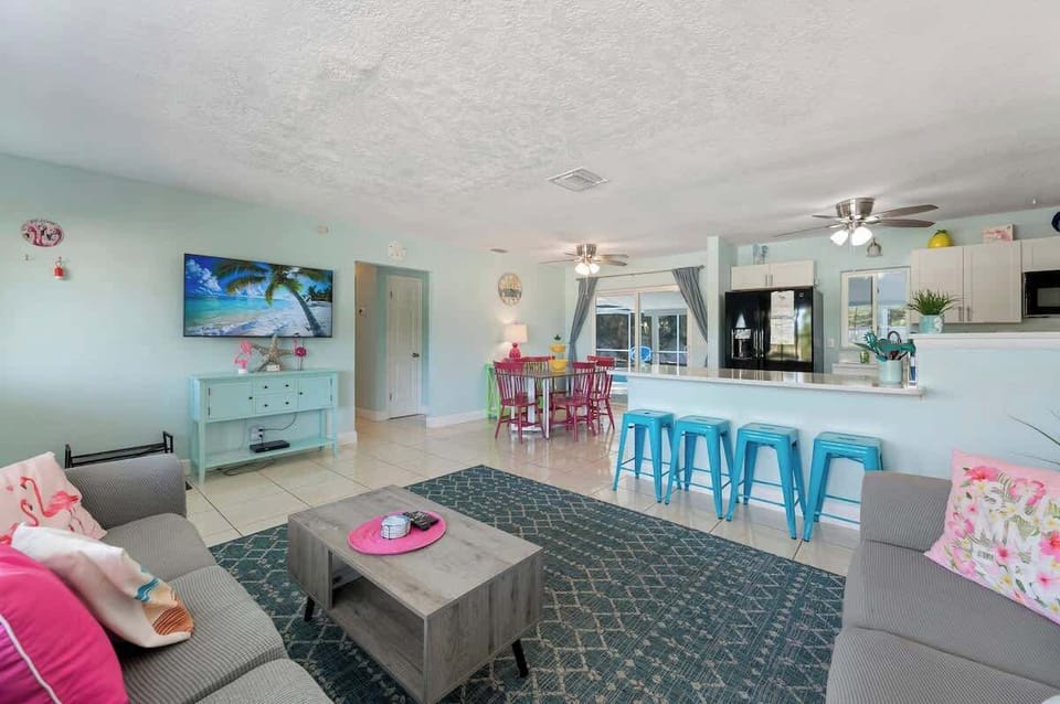 Comfortable living area with seating and TV