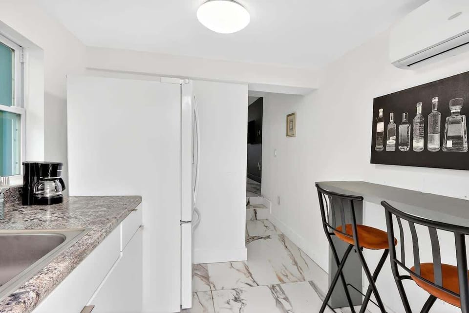 Floating dining table with seating for two