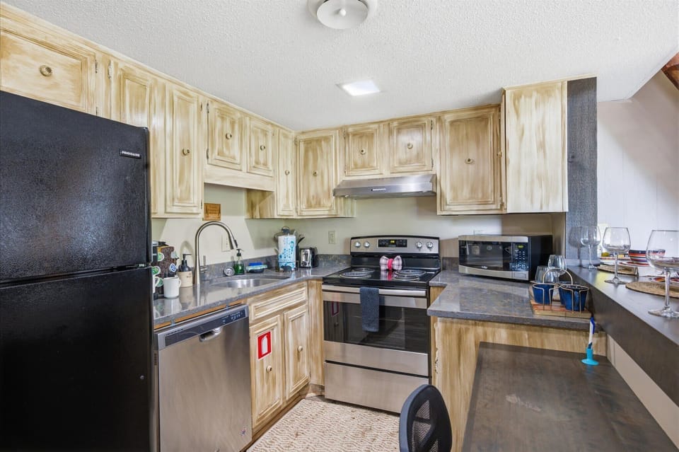 Fully equipped kitchen ready for home-cooked meals.