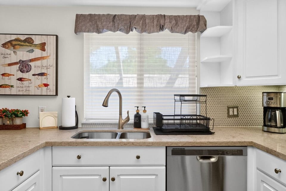 Stainless steel dishwasher, or enjoy the view while washing by hand