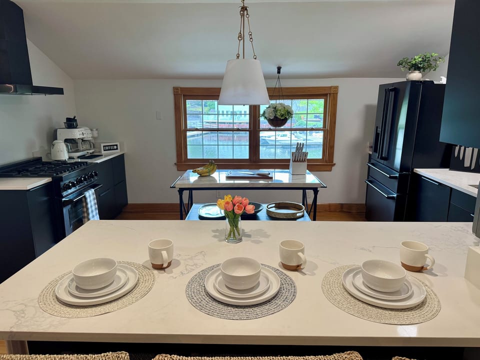 Casual breakfast seating overlooking the heart of the home