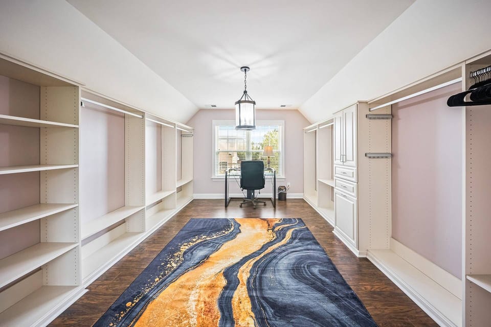 n open passageway with smart storage and inviting details!