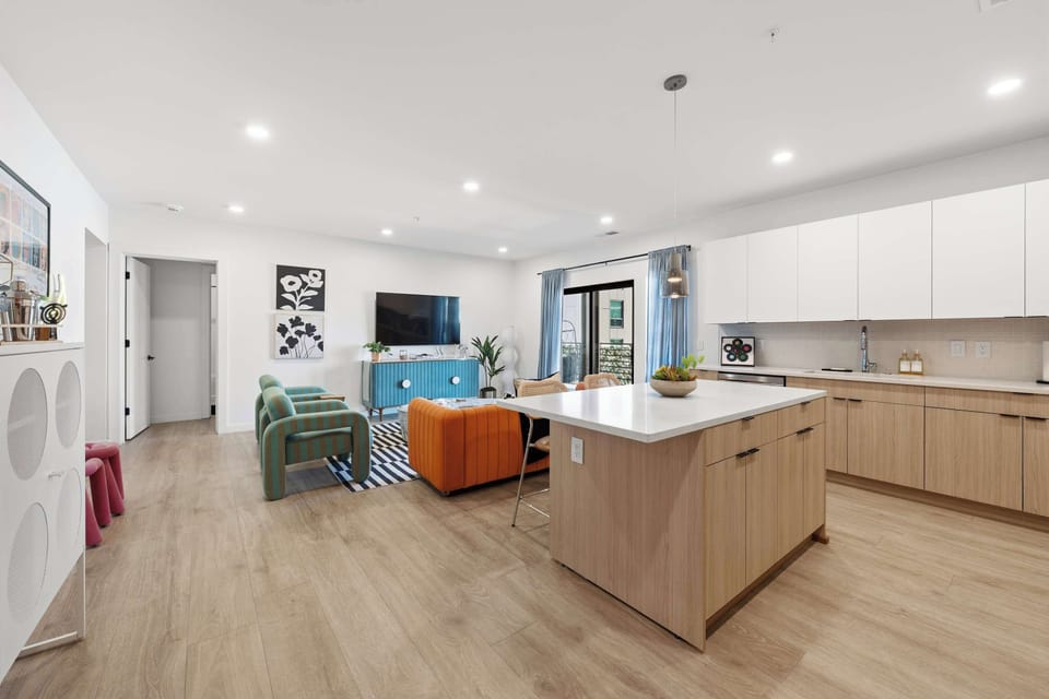Comfortable seating area steps from open-concept kitchen