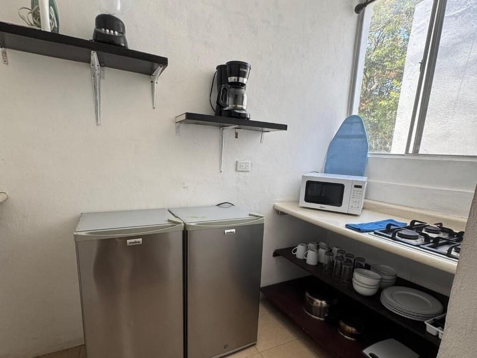 Apartment, 4 Bedrooms, Air conditioning, Garden View | Private kitchen