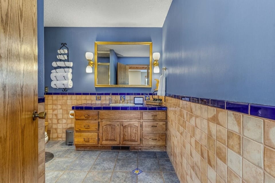 A full bath on the main level adds comfort and convenience for every guest.