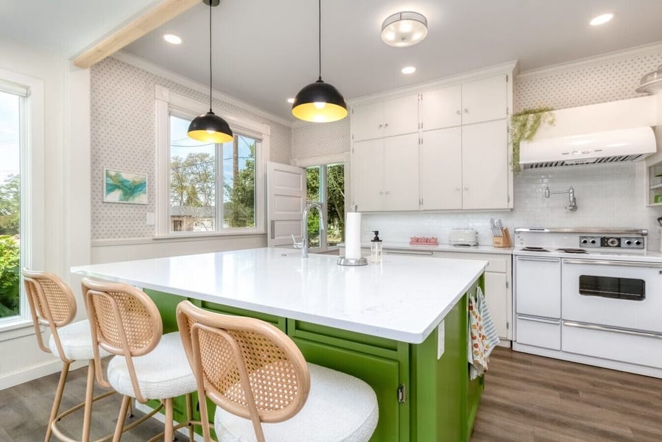 Bright kitchen with oversized island seating and plenty of prep space.