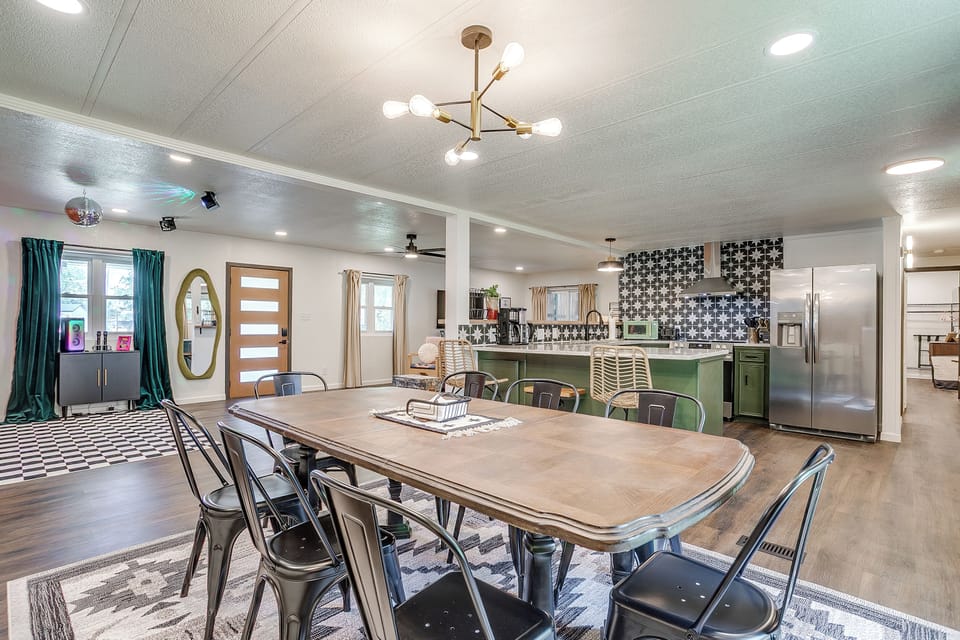 Dining area with seating for 6, perfect for meals, games, and time together.