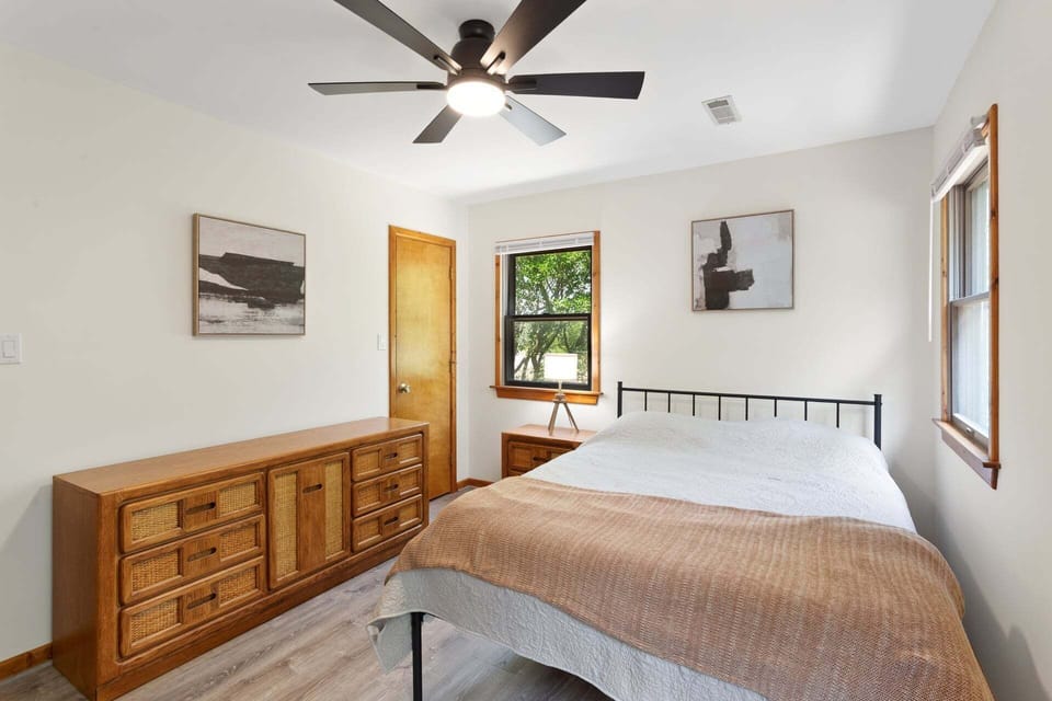 The private queen ensuite bedroom offers a peaceful retreat after a day of Outer Banks adventures.
