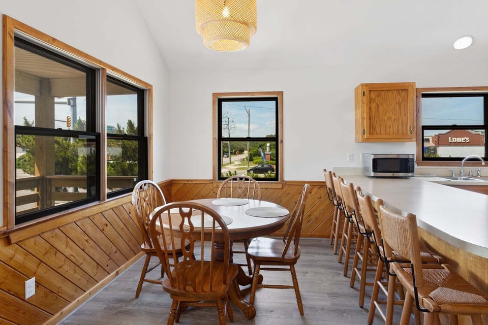 Share meals, games, and vacation memories around the dining table.