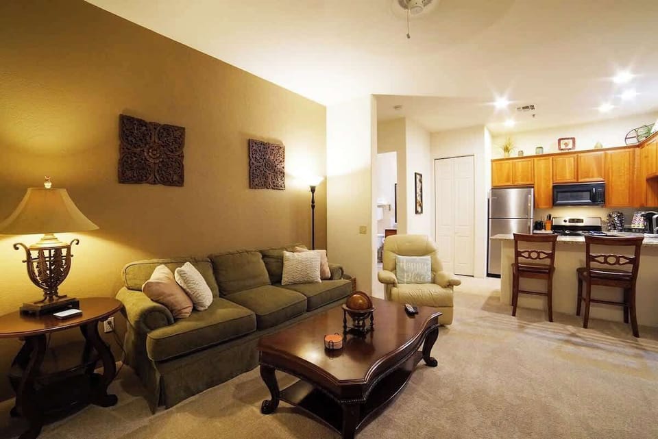 Open concept living area with a sofa bed for added comfort and TV to watch your favorite shows