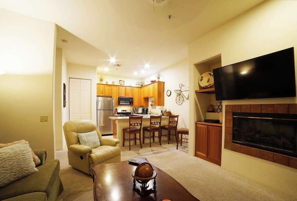 Open concept living area with a sofa bed for added comfort and TV to watch your favorite shows