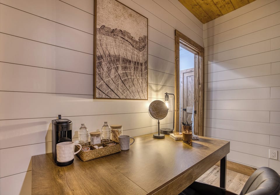 Cozy rustic workspace with coffee station and warm cabin-inspired design