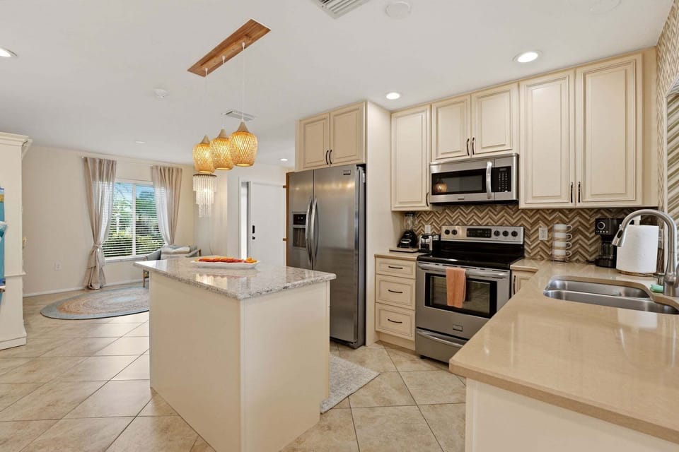 Well-stocked, well-organized, and designed for cooking for a crowd. Everything you need is in reach and someone always ends up here.