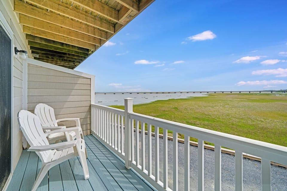 Breathtaking Views of the Bay, Oyster Beds, and Chincoteague Causeway in the distance.