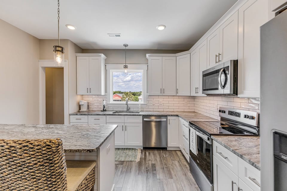 Beautiful light and airy kitchen with k cup coffee maker