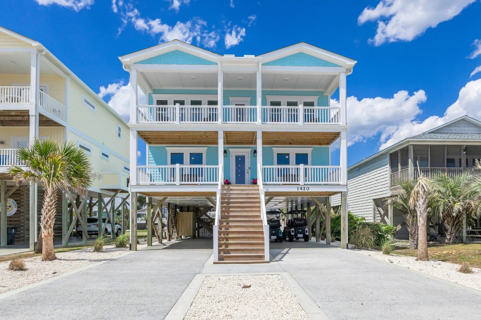 Beautiful Oak Island, NC beach rental with private pool, spacious decks, and easy beach access—perfect for family vacations and coastal getaways