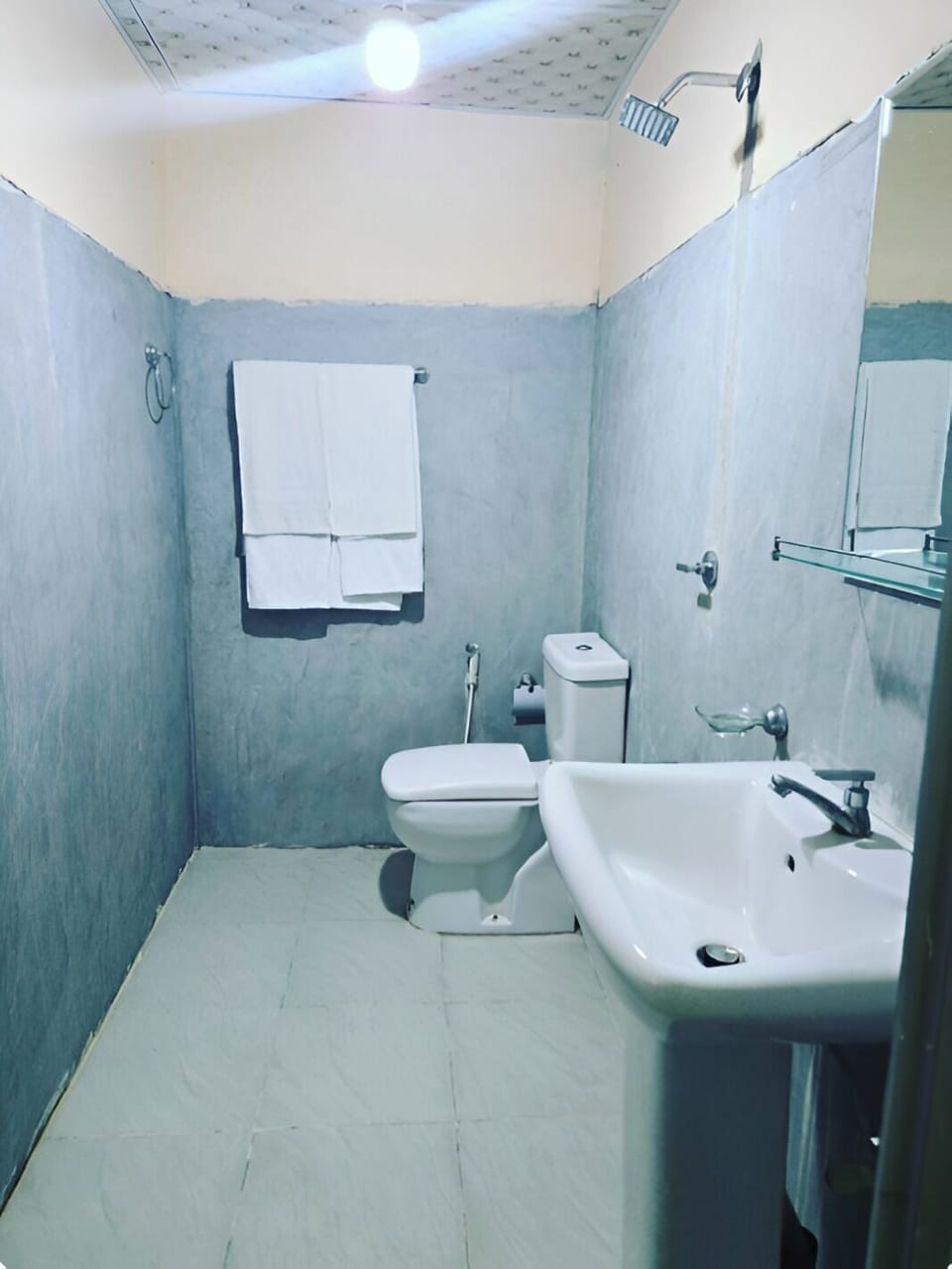 Shower, slippers, towels, soap