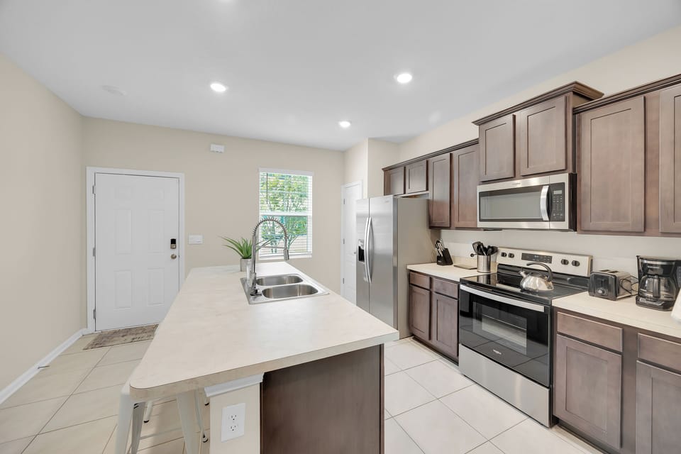 Kitchen Delight: Bright and spacious kitchen with modern appliances for culinary adventures!