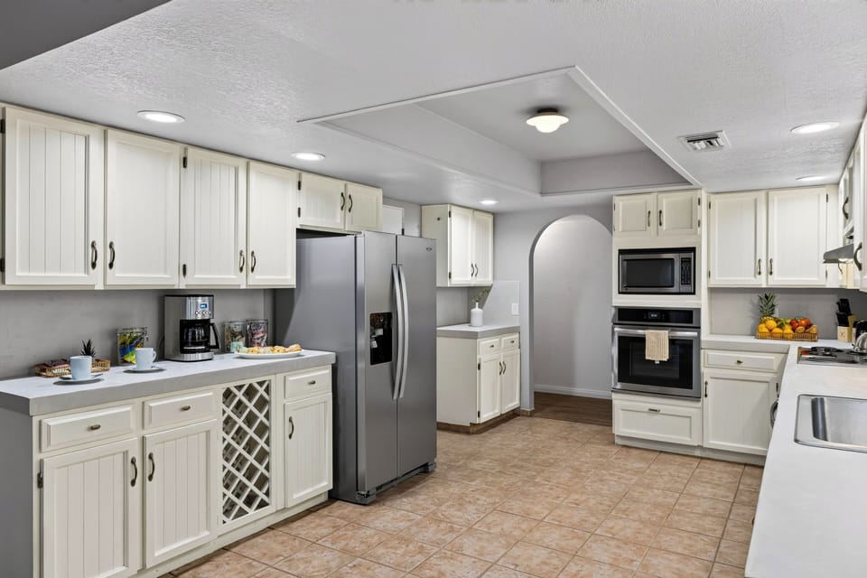 Spacious full kitchen with stainless steel appliances, ample cabinetry, and everything needed for easy meals.