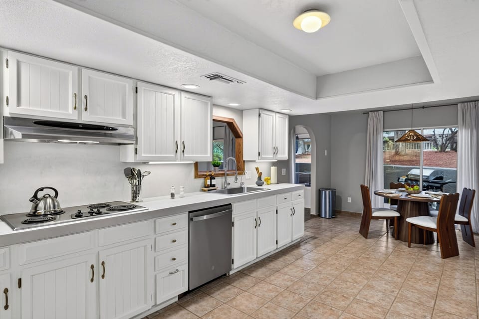 Spacious full kitchen with stainless steel appliances, ample cabinetry, and everything needed for easy meals.