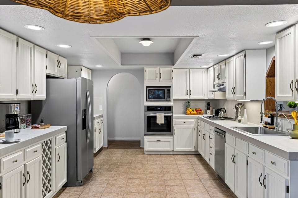 Spacious full kitchen with stainless steel appliances, ample cabinetry, and everything needed for easy meals.