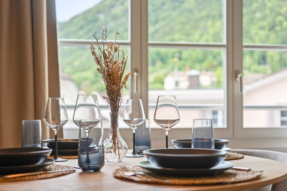 Gather around the table and enjoy your meals with beautiful mountain views, warm natural light, and thoughtful touches to welcome you home.
