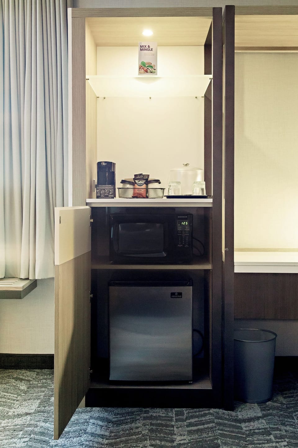 Hypo-allergenic bedding, desk, laptop workspace, blackout drapes