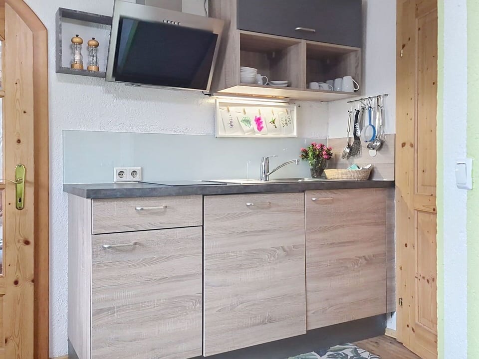 Wood, Cabinetry, Furniture, Interior Design, Flooring, Kitchen Sink, Kitchen, Kitchen Appliance, Countertop, Home