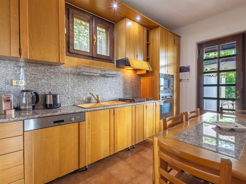Kitchen, Wood, Countertop, Interior Design, Flooring, Cabinetry, Kitchen Appliance, Floor, Major Appliance, Room