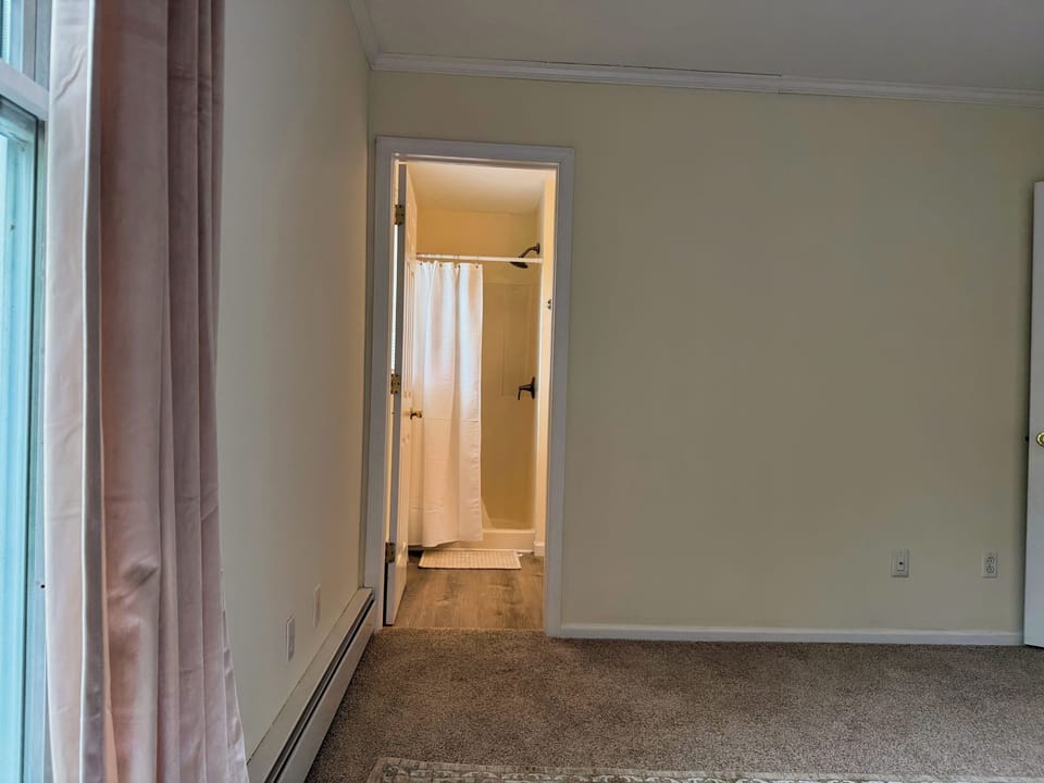 2nd floor bedroom with Queen bed and ensuite bathroom