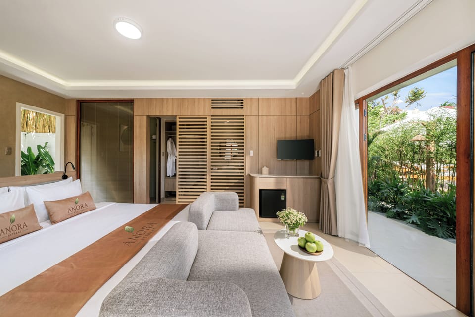 Luxury Suite, Patio, Pool View | Premium bedding, minibar, in-room safe, soundproofing