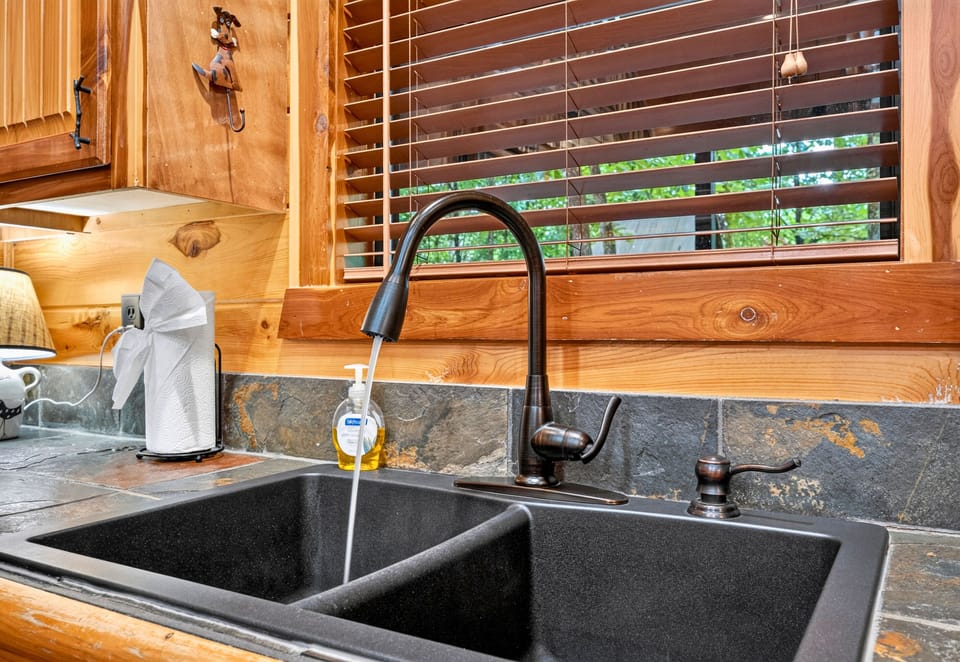 Large windows above the sink let you enjoy peaceful wooded views while cleaning up after dinner or brewing another fresh cup of coffee.