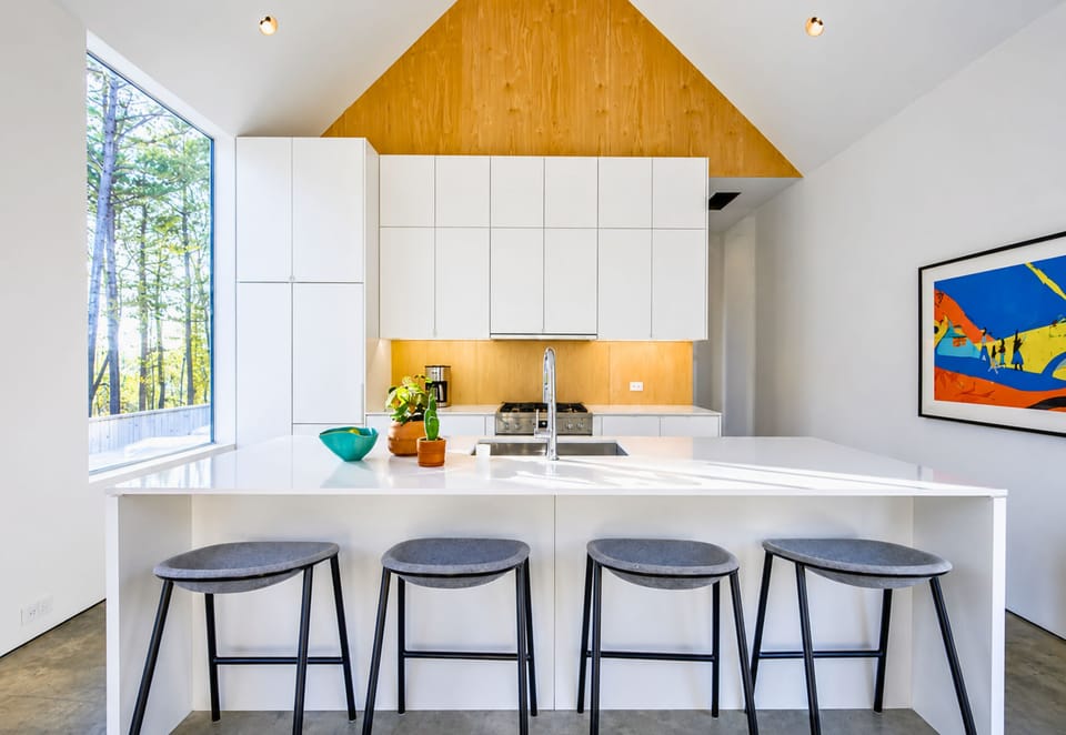 Gather around the oversized island for snacks, drinks, or casual conversation while meals are being prepared.