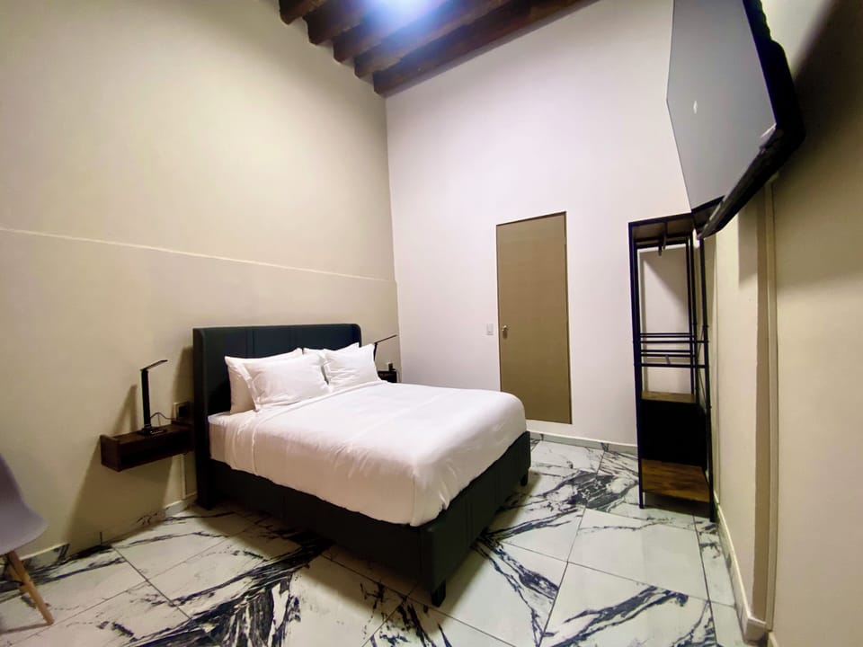 Basic Double Room | Bathroom | Combined shower/tub, free toiletries, hair dryer, soap