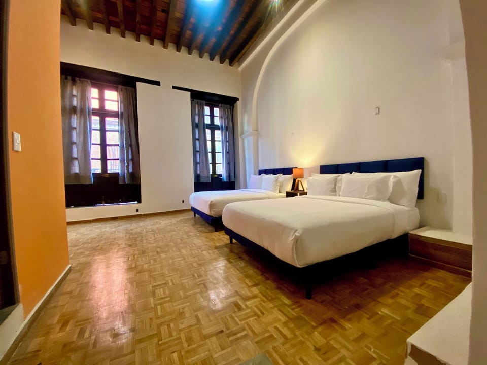 Classic Quadruple Room, Balcony, City View | Iron/ironing board, free WiFi, bed sheets