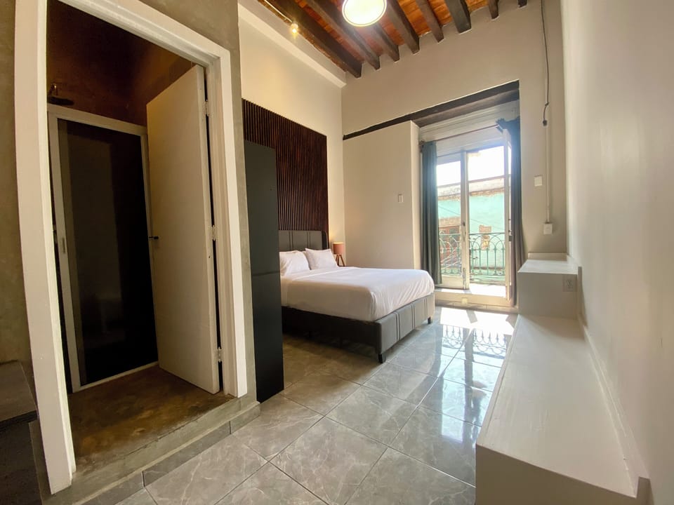 Basic Double Room, Balcony, City View | Iron/ironing board, free WiFi, bed sheets