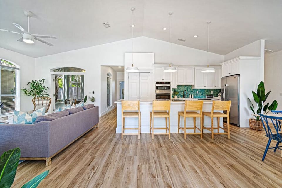 Soaring ceilings, a stunning woven pendant, and natural light pouring in.